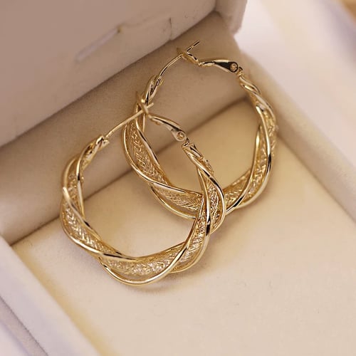 GlowAura™ Twist Earrings – Elegant Sparkling Statement Jewelry