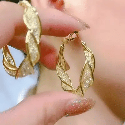 GlowAura™ Twist Earrings – Elegant Sparkling Statement Jewelry