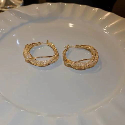 GlowAura™ Twist Earrings – Elegant Sparkling Statement Jewelry