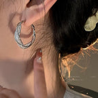 GlowAura™ Twist Earrings – Elegant Sparkling Statement Jewelry