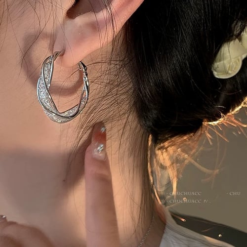 GlowAura™ Twist Earrings – Elegant Sparkling Statement Jewelry
