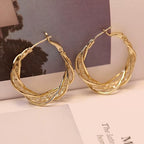 GlowAura™ Twist Earrings – Elegant Sparkling Statement Jewelry