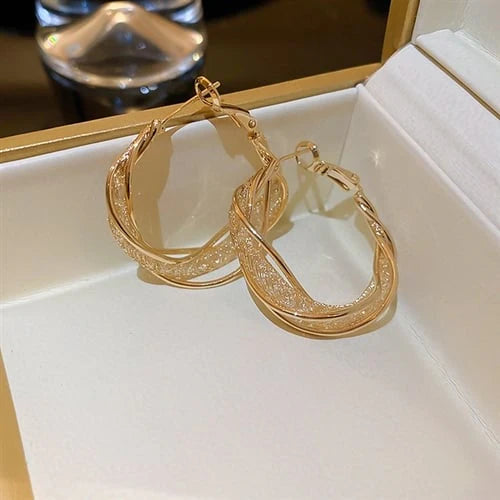 GlowAura™ Twist Earrings – Elegant Sparkling Statement Jewelry